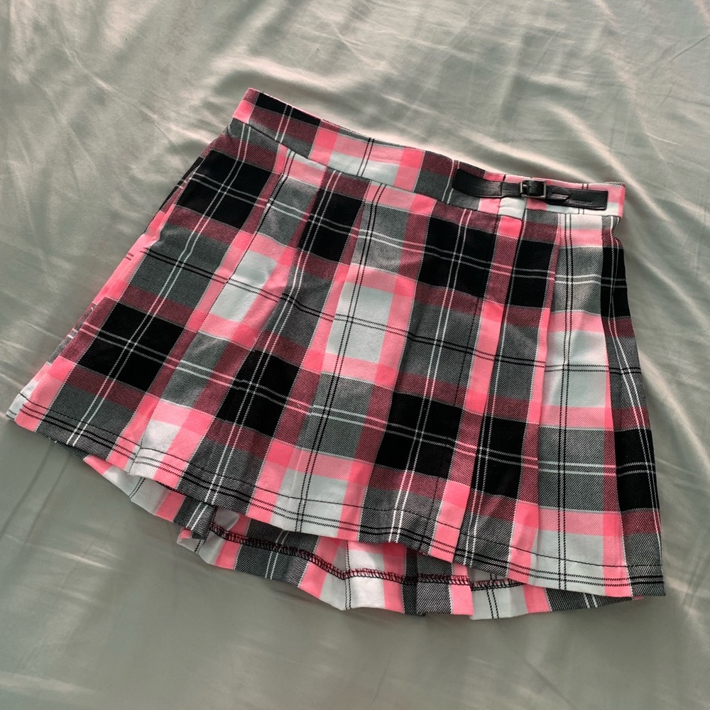 a pink white & black plaid skirt